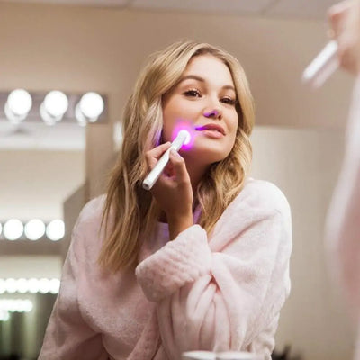 Red Blue Light Therapy Pen in use