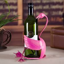 Flamingo Wine Holder sculpture with wine bottle.